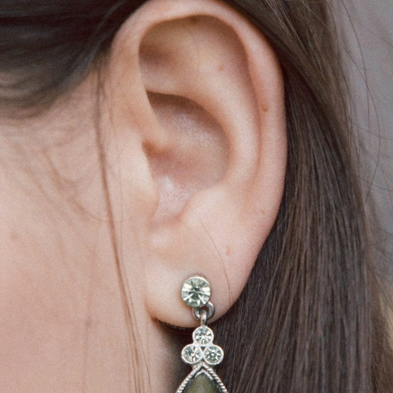 Image of  an ear of a young woman.